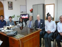 3 DevPar consultants pose seated with 4 representatives of the Office of the Comptroller and Auditor General