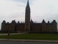 Parliament Buildings of Ottawa under a grey sky